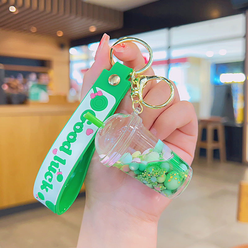 Wholesale Acrylic Green Liquid Into The Oil Quicksand Bottle Series Key Chain