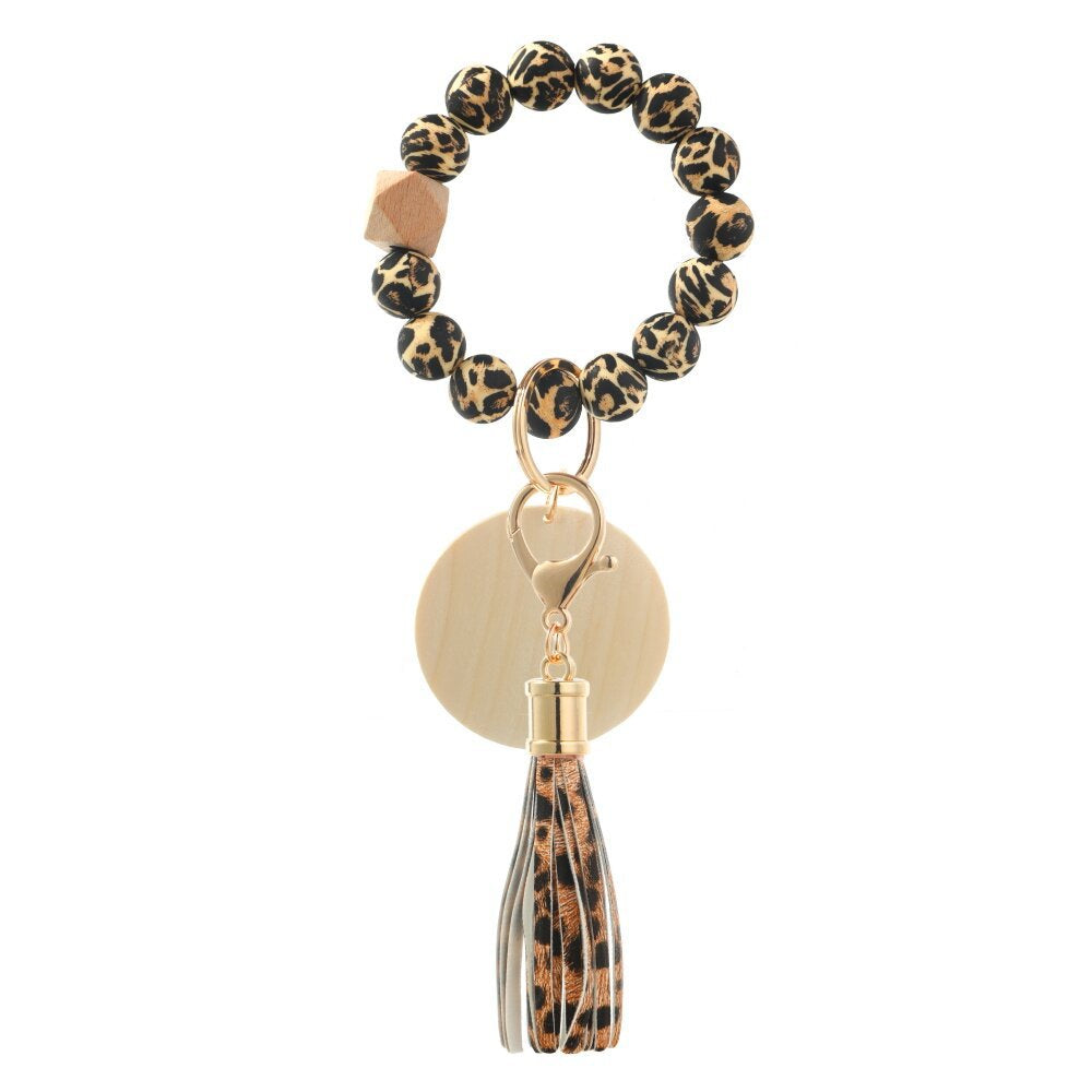 Venta al por mayor Llavero de pulsera de cuentas de silicona con estampado de leopardo