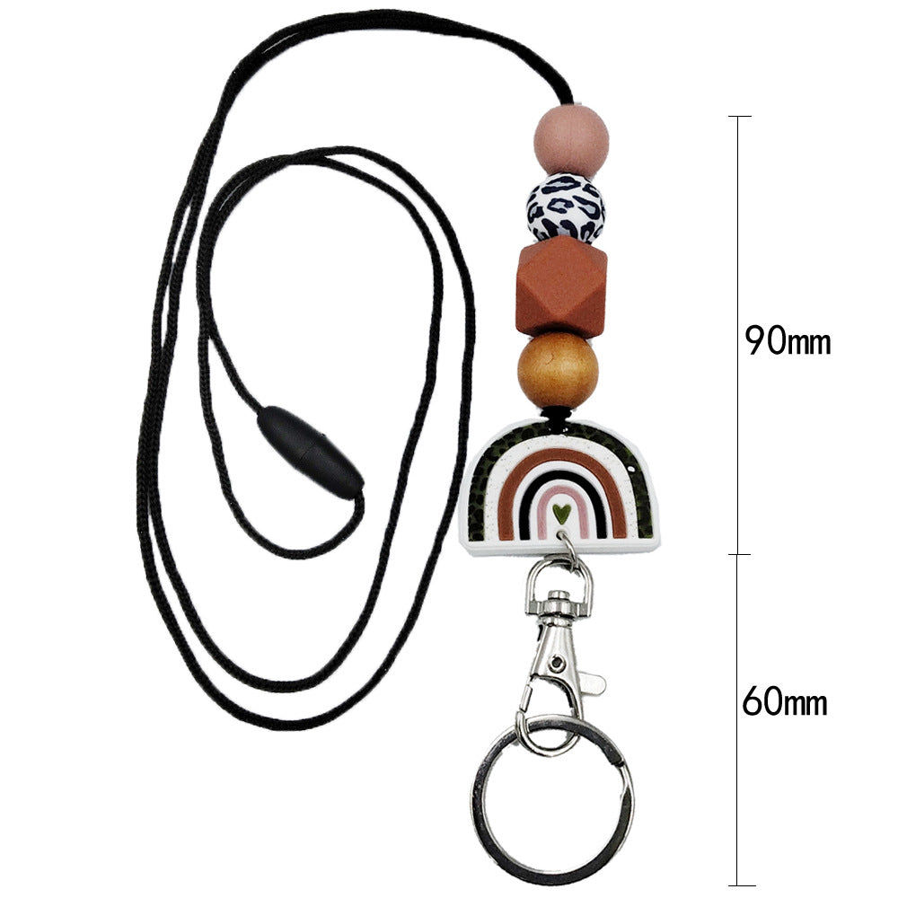 Venta al por mayor Llavero de cordón de arco iris con cuentas de silicona