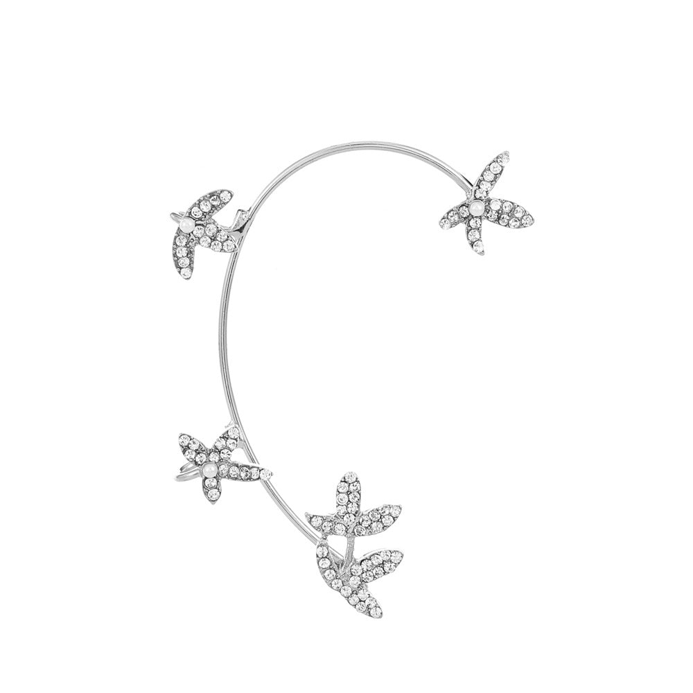 Venta al por mayor Pendientes de aleación de manguito de oreja de mariposa de diamante