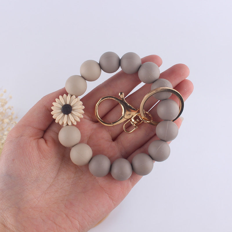 Llavero de muñeca de silicona de Pu Tassel al por mayor