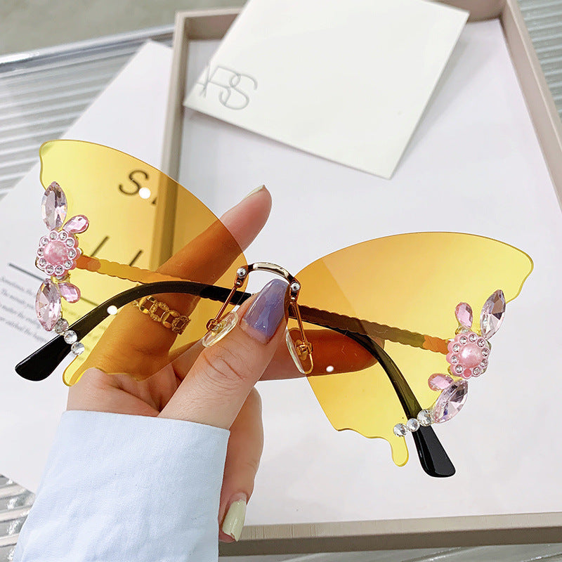 Wholesale Butterfly Diamond Rimless PC Sunglasses