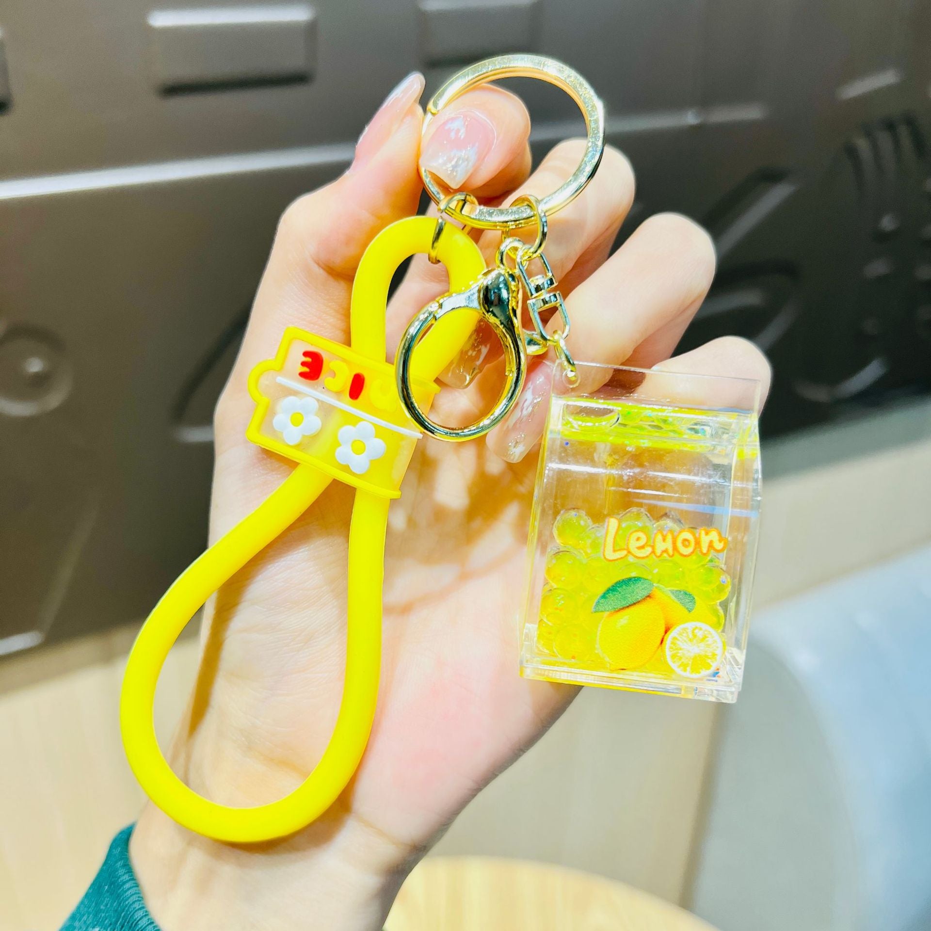 Wholesale Acrylic Fruit Oil Quicksand Drift Bottle Keychain