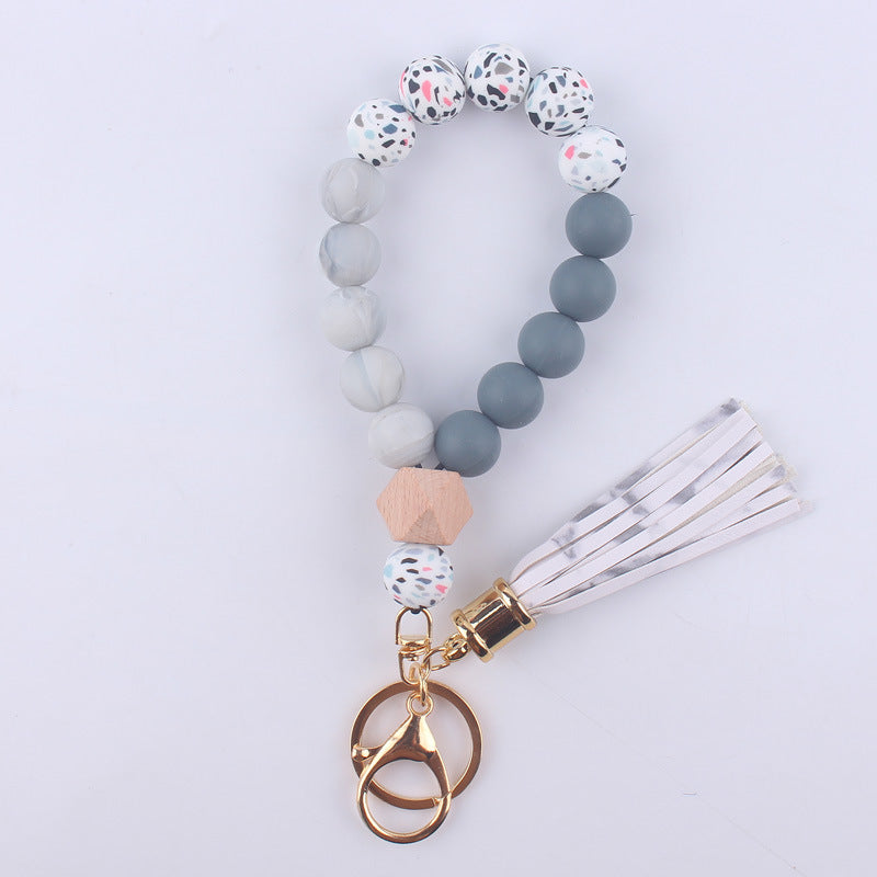 Wholesale Tassel Leather PU Silicone Beaded Wrist Keychains