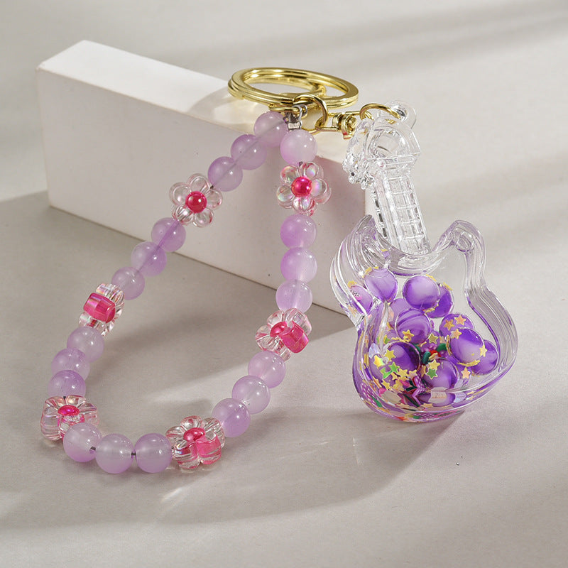 Wholesale Acrylic Oil in Quicksand Bottles, Luminous Violins, Beaded Chains, Keychains