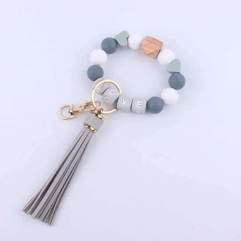 Wholesale Tassel Leather PU Silicone Beaded Wrist Keychains
