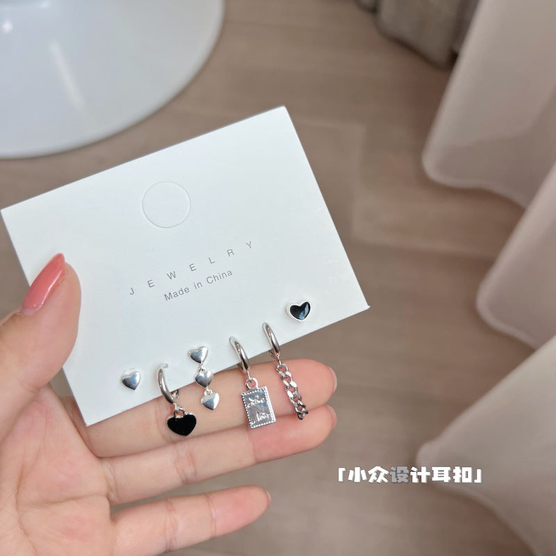 Pendientes de aleación de cuatro piezas con borla de aguja de plata 925 al por mayor