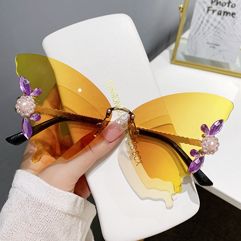 Wholesale Butterfly Diamond Rimless PC Sunglasses