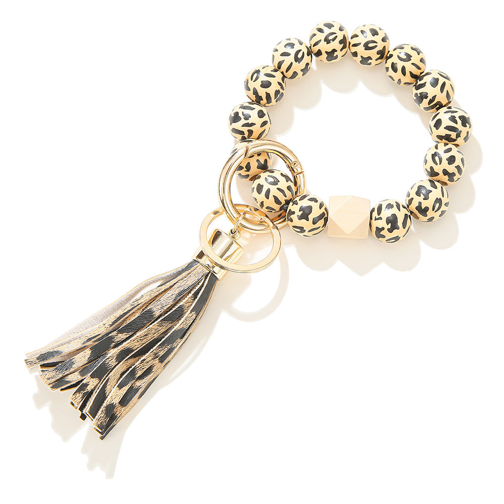 Llavero de muñeca con cuentas de madera con patrón manchado al por mayor