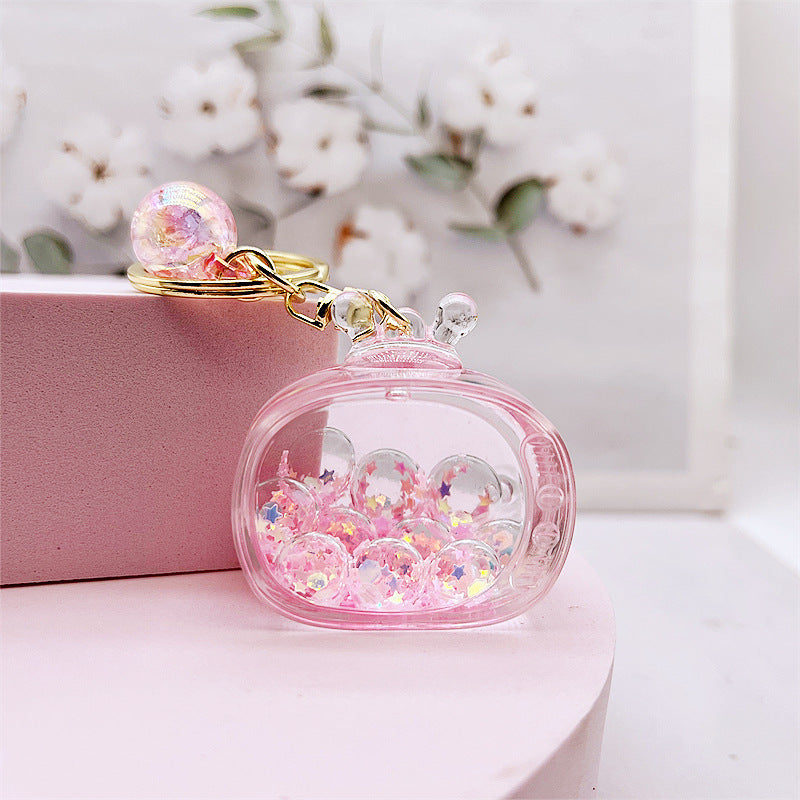 Comercio al por mayor acrílico transparente líquido arenas movedizas llavero creativo