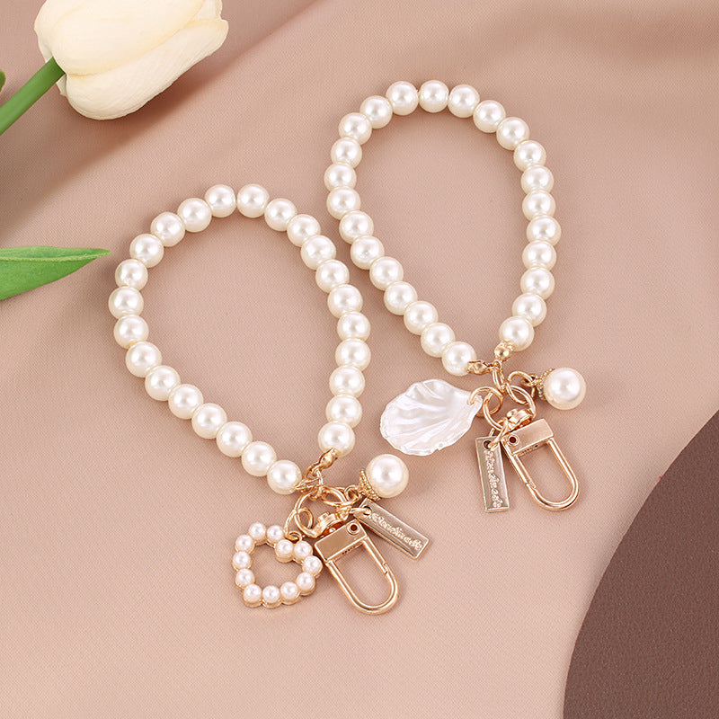 Wholesale Pearl Shell Metal Bracelet Keychain