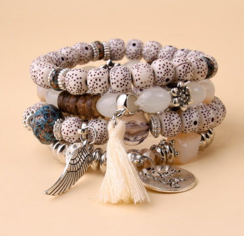 Venta al por mayor Pulsera de cristal con borla de perlas multicapa