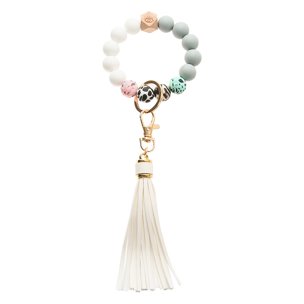 Llavero de muñeca con cuentas de silicona de leopardo colorido al por mayor