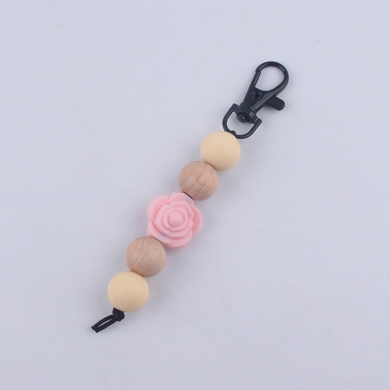 Llavero de cuentas de madera de rosa de silicona al por mayor