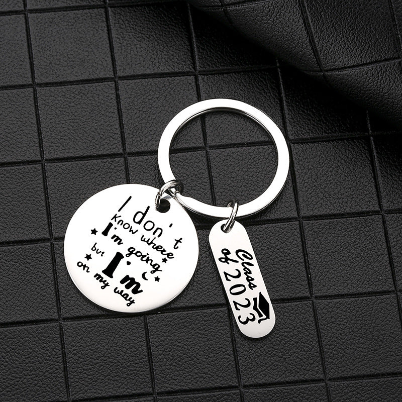 Venta al por mayor Llavero de regalo de temporada de graduación de acero inoxidable 2023