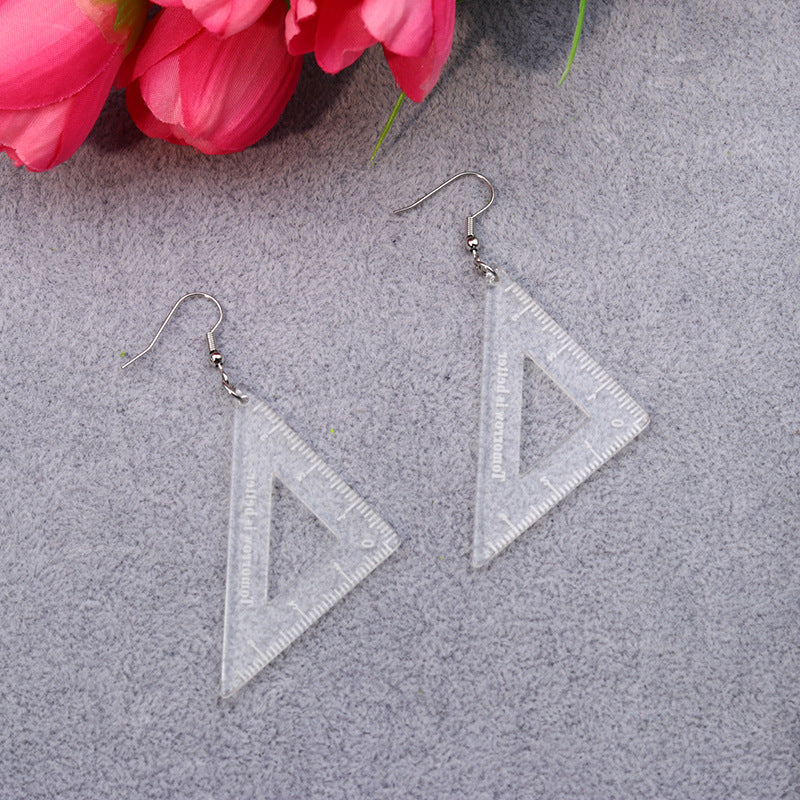 Wholesale Backpacks, Paintbrush Boxes, Magnifying Glass Houses, Acrylic Earrings