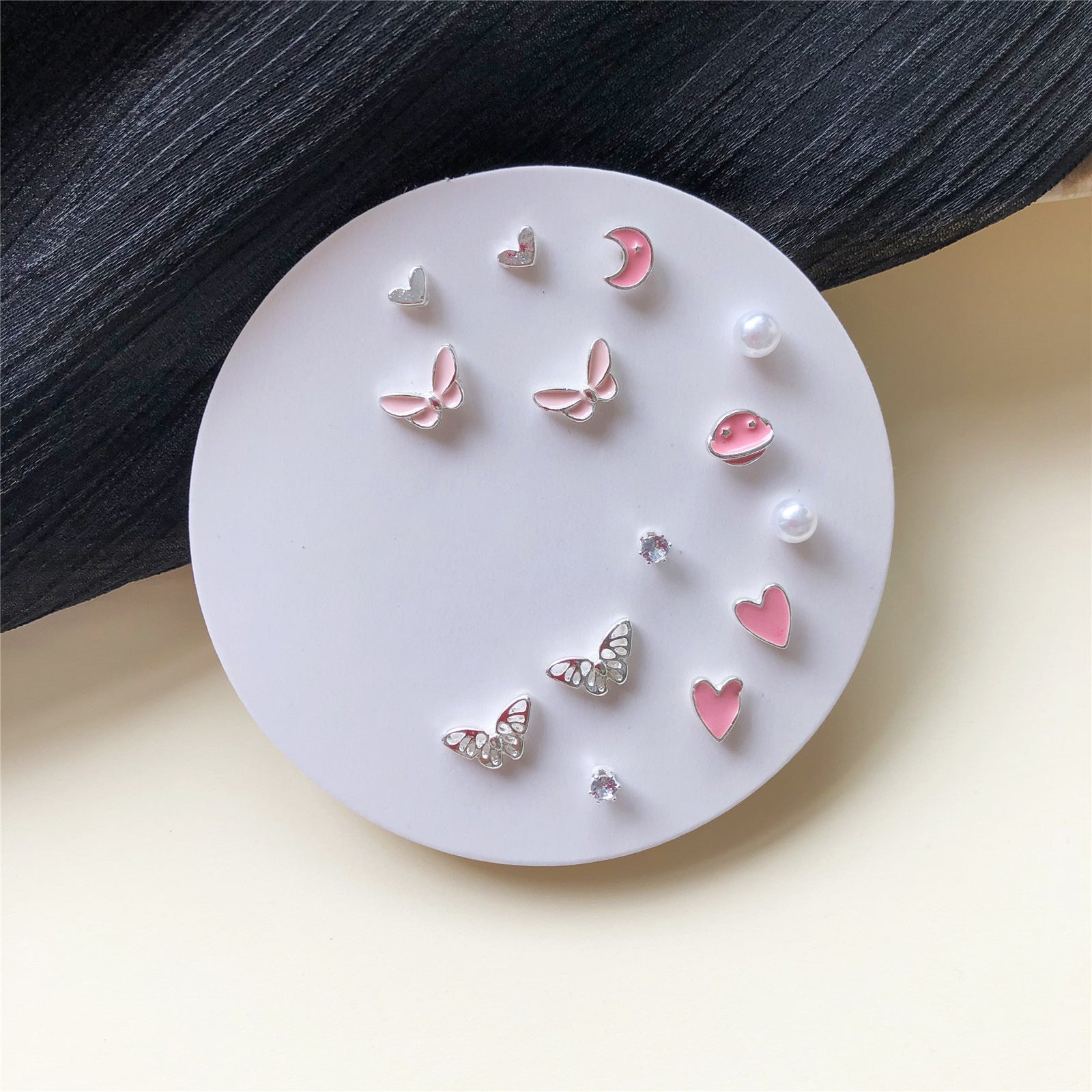 Venta al por mayor Conjunto de aretes de una semana Aretes de aleación