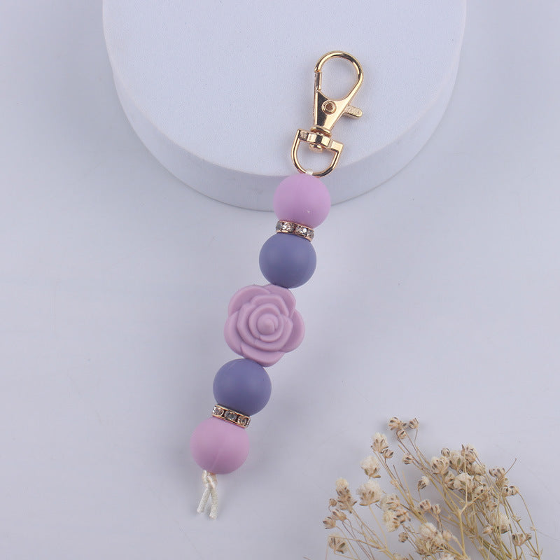 Llavero con cuentas de silicona rosa de doble cara al por mayor