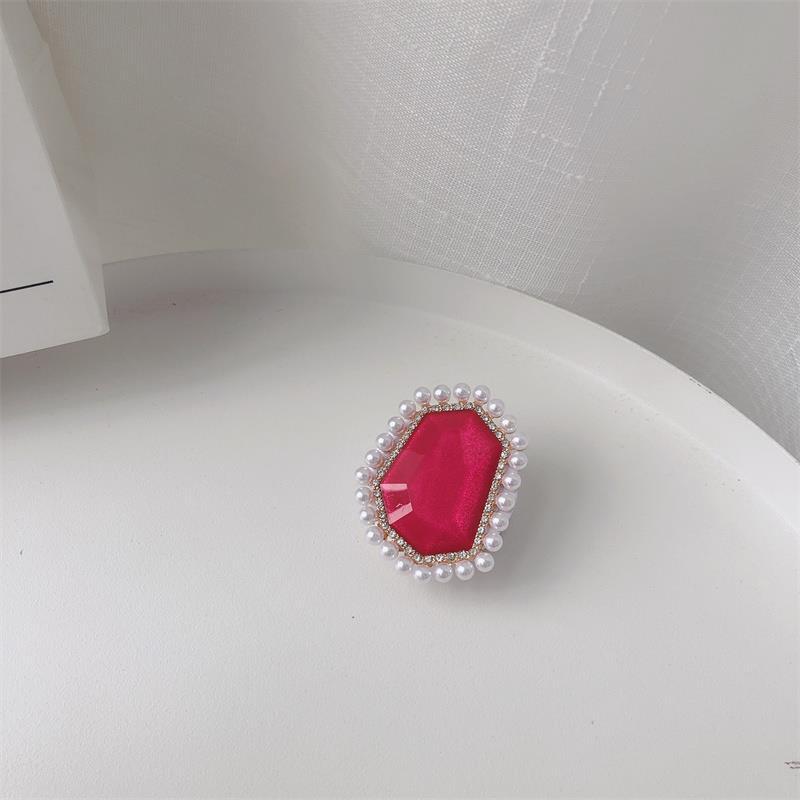 Venta al por mayor Soporte para teléfono móvil de perlas de piedras preciosas