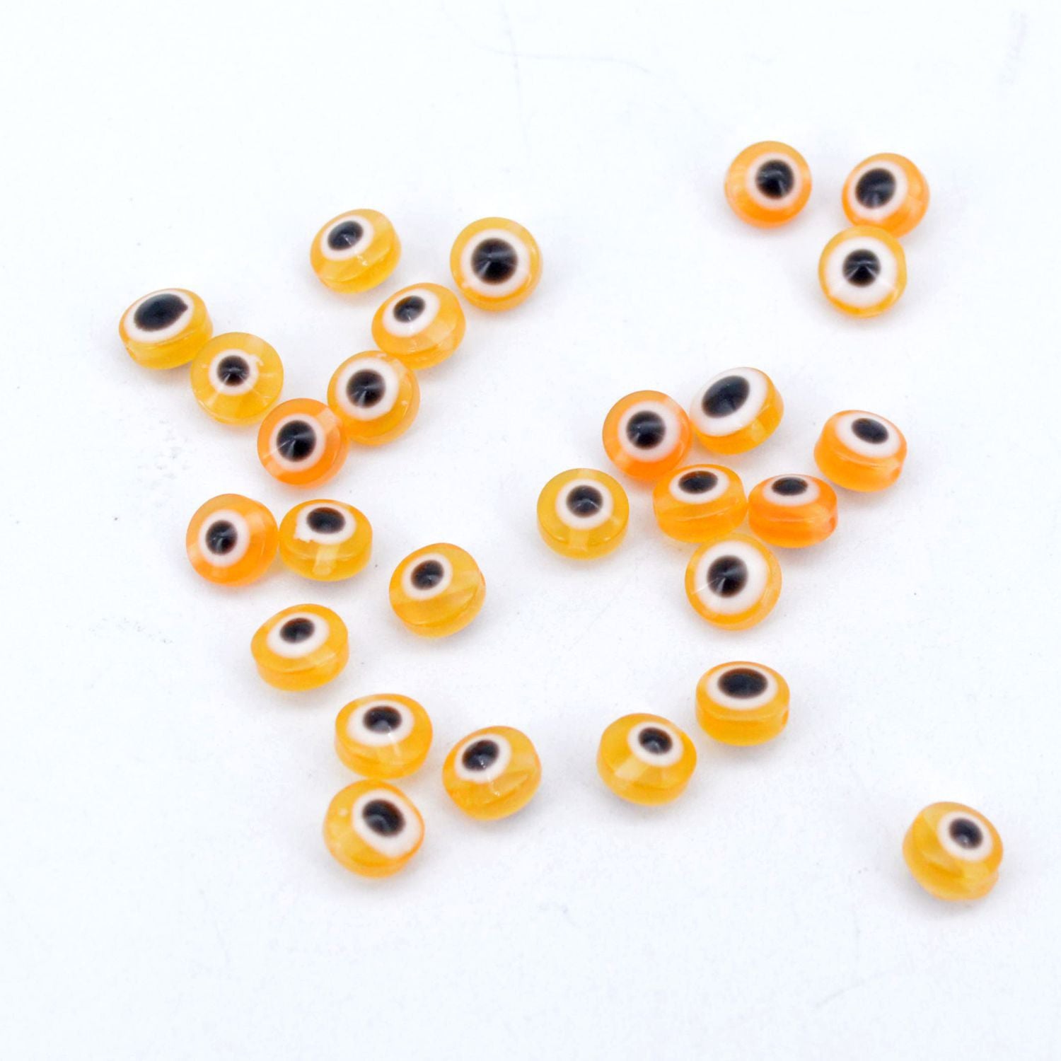 Venta al por mayor 6*2,5 MM 1000 unids/pack cuentas separadoras de resina de ojo de diablo