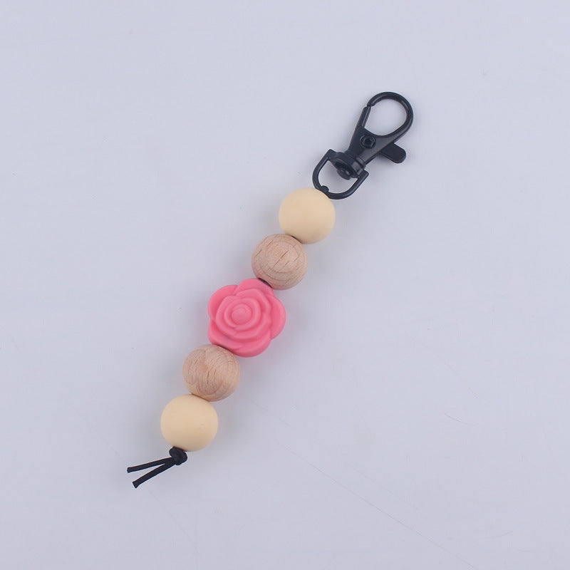 Llavero de cuentas de madera de rosa de silicona al por mayor