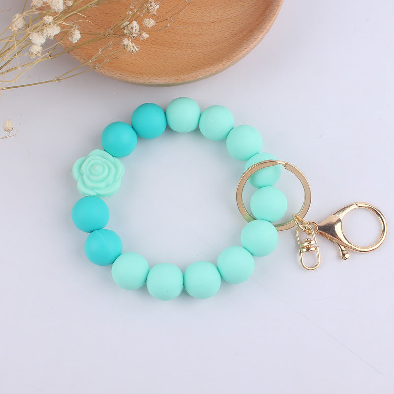 Llavero de muñeca de silicona de Pu Tassel al por mayor