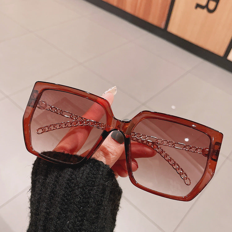 Venta al por mayor Gafas de sol de mujer con caja grande de cadena