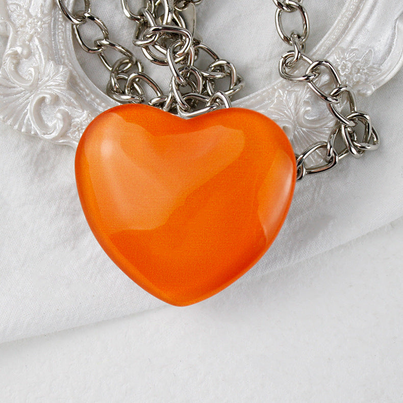 Soporte de teléfono de vidrio de corazón pequeño de melocotón al por mayor