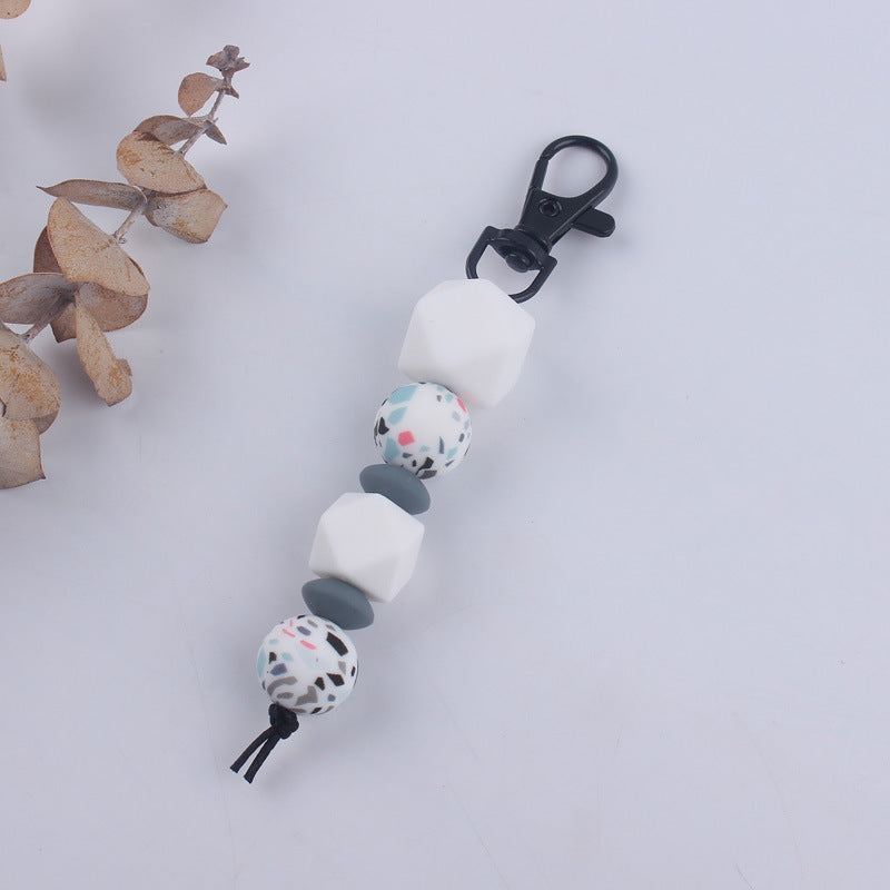 Llavero con cuentas de leopardo de silicona al por mayor