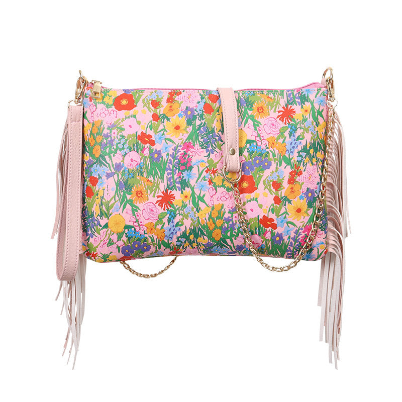 Bolso de hombro con estampado de flores grandes y borlas de PU al por mayor