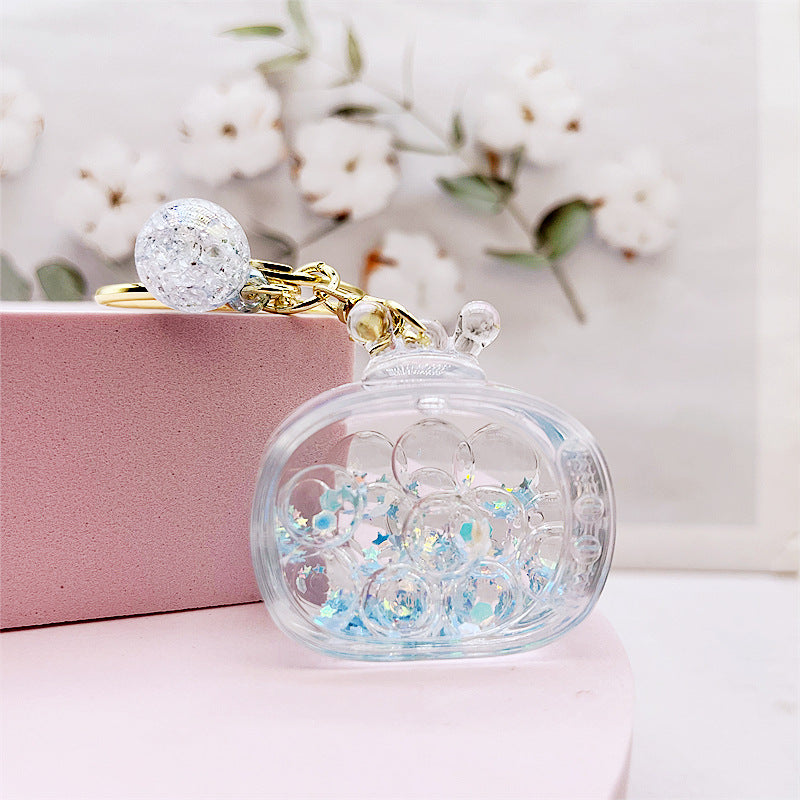 Comercio al por mayor acrílico transparente líquido arenas movedizas llavero creativo