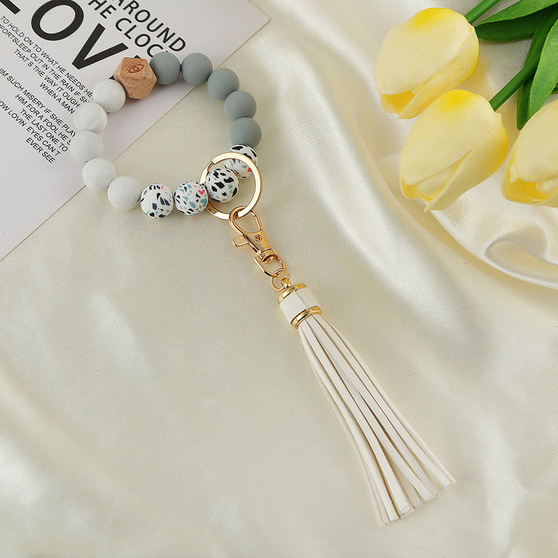 Venta al por mayor Llavero de muñeca con cuentas de silicona