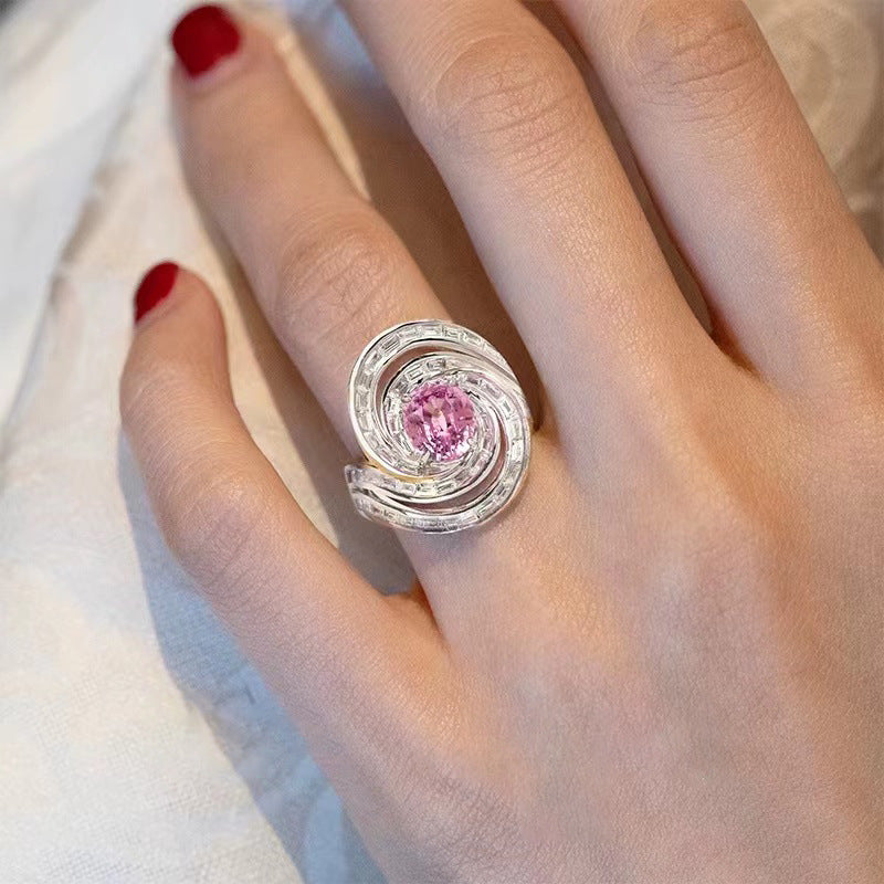 Venta al por mayor Anillos de cobre chapados en rodio con rotación de circonio