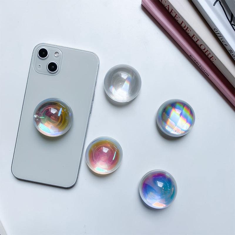 Soporte plástico al por mayor del teléfono móvil del airbag del laser de la bola de cristal