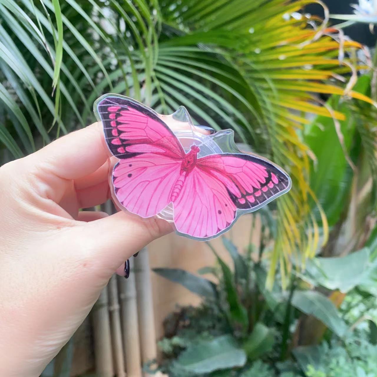 Venta al por mayor Soporte de teléfono móvil de mariposa pintada de acrílico