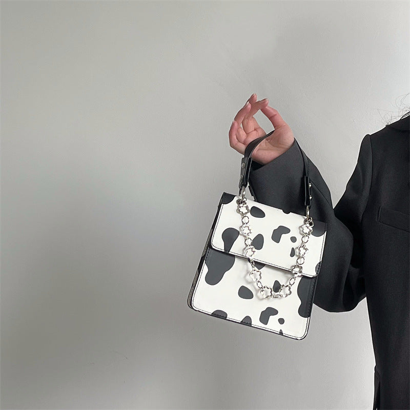 Wholesale Faux Leather Cow Pattern Small Square Shoulder Bag