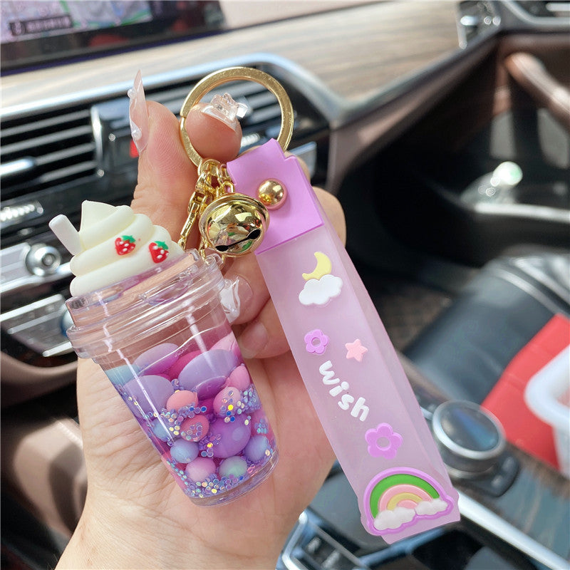 Llavero de nieve con arena para nieve con pozos de fresa con infusión de aceite de PVC.