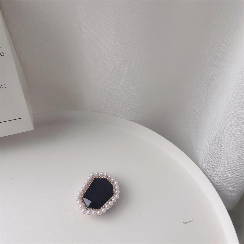 Venta al por mayor Soporte para teléfono móvil de perlas de piedras preciosas