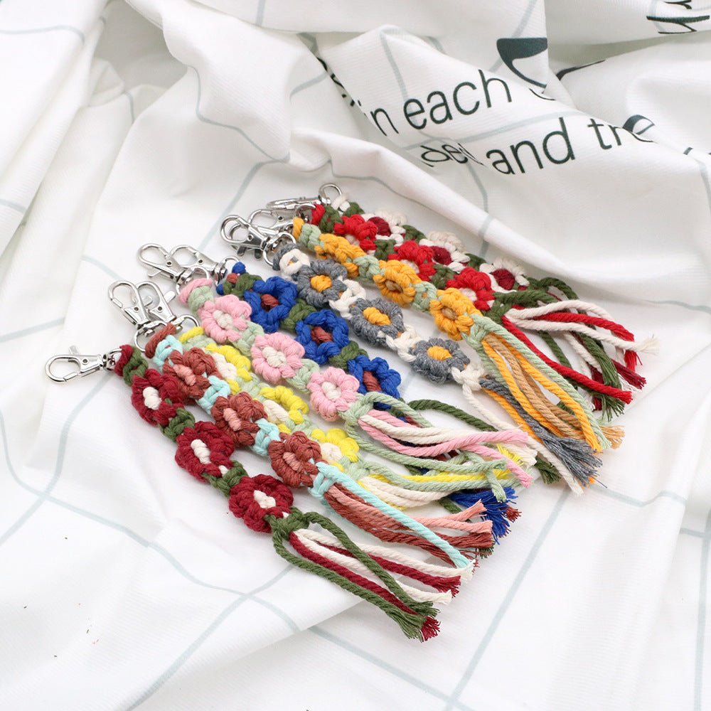 Venta al por mayor Llavero trenzado de flor pequeña de metal