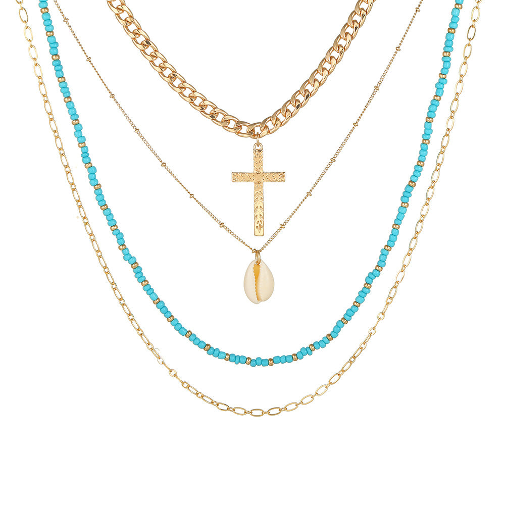 Venta al por mayor collar de cruz de concha de cuentas demi multicapa