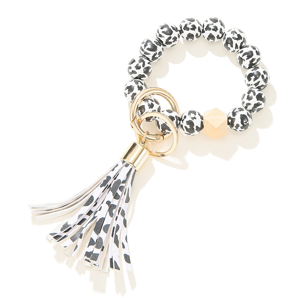 Llavero de muñeca con cuentas de madera con patrón manchado al por mayor