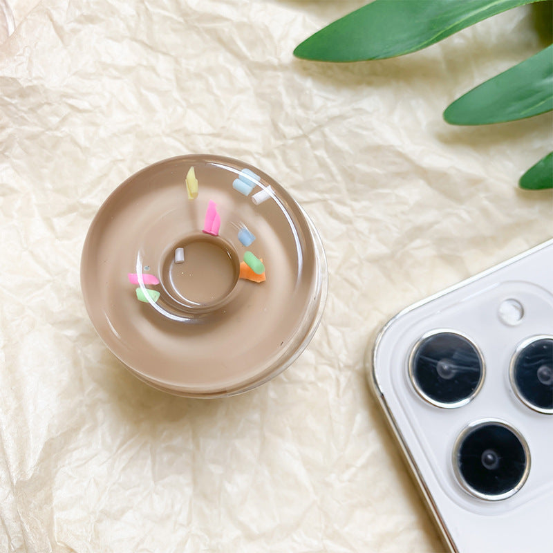 Venta al por mayor soporte de bolsa de aire para teléfono móvil de donuts de resina