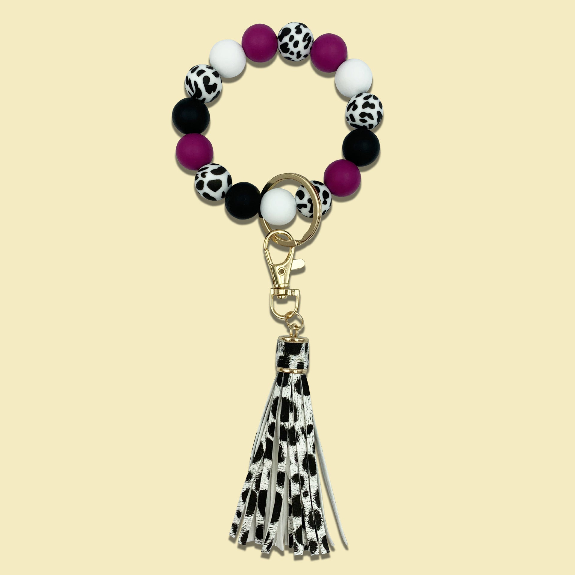 Llavero de muñeca con borla de silicona con estampado de leopardo al por mayor