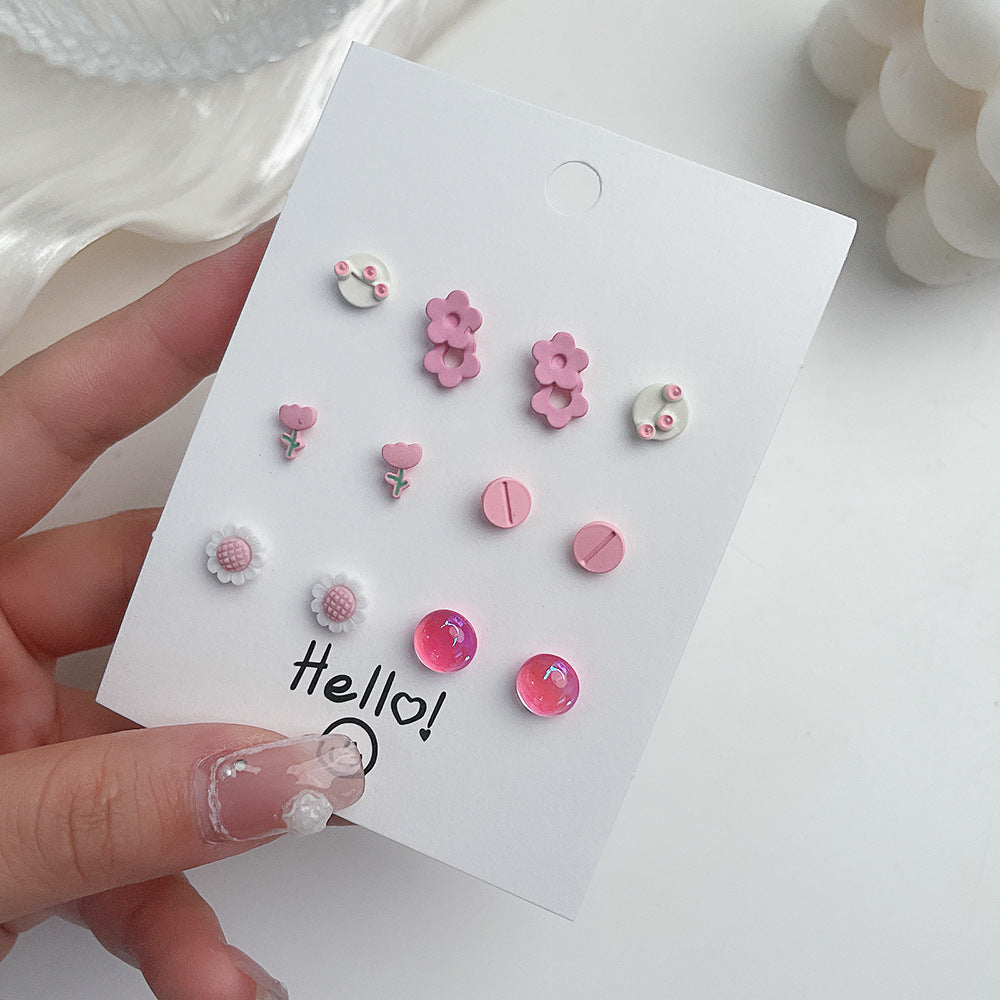 Venta al por mayor Conjunto de pendientes de aleación con forma de corazón y mariposa