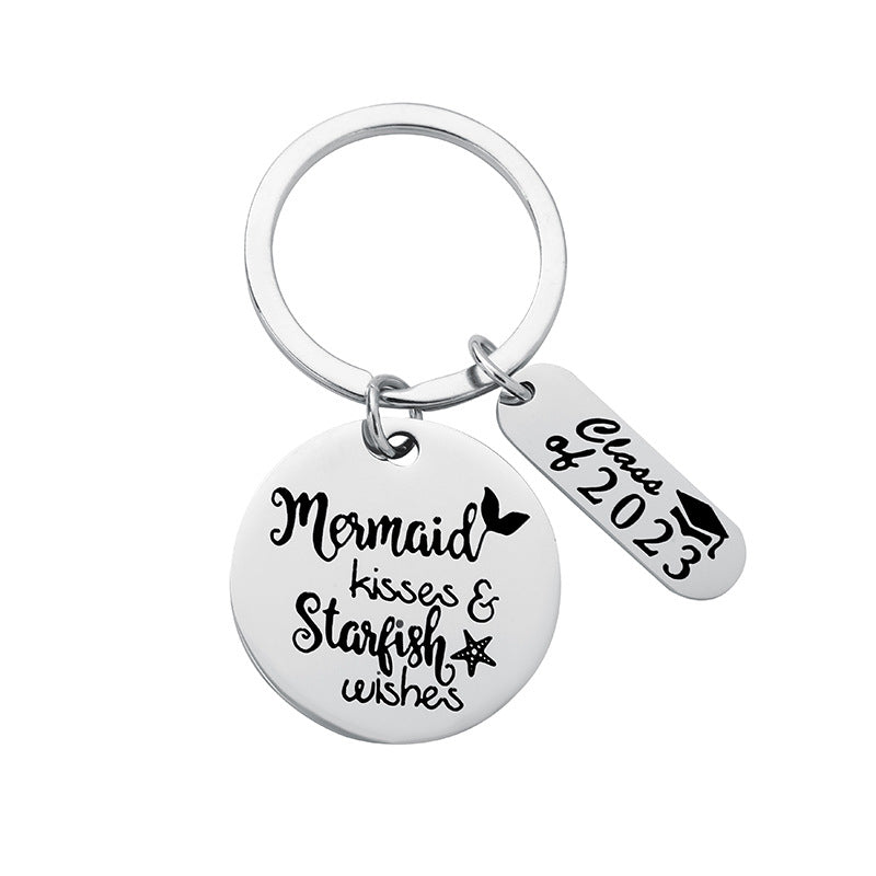 Venta al por mayor Llavero de regalo de temporada de graduación de acero inoxidable 2023