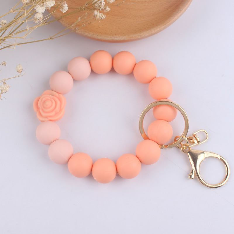 Llavero de muñeca de silicona de Pu Tassel al por mayor