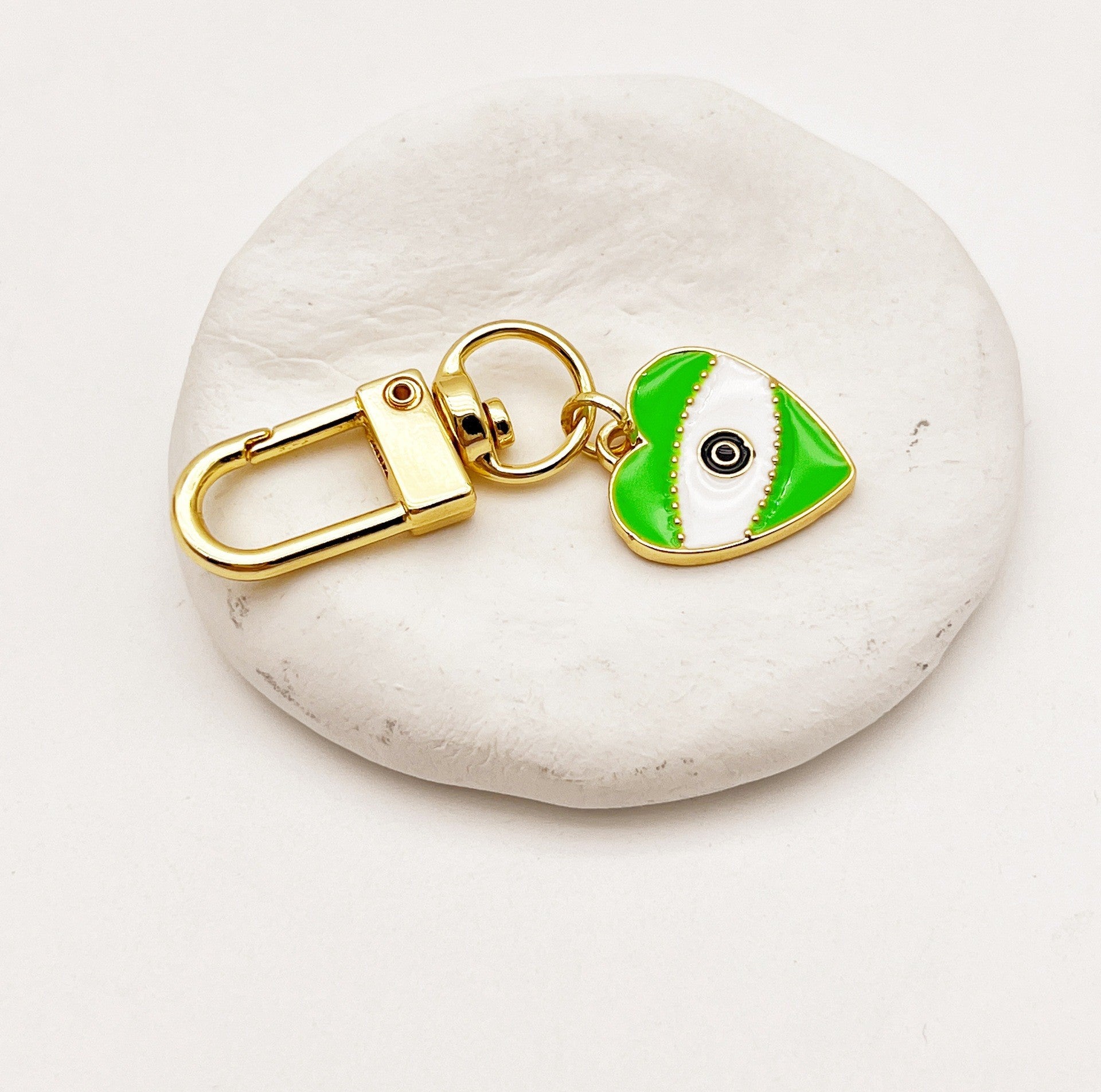 Venta al por mayor Llaveros De La Aleación Del Corazón Del Ojo Del Diablo