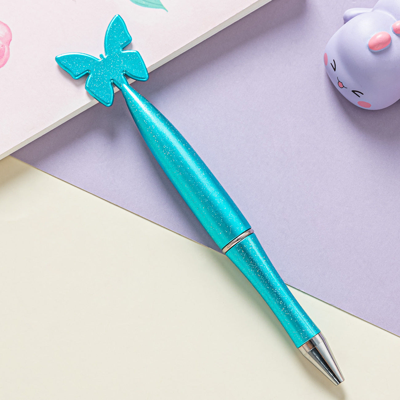 Venta al por mayor Bolígrafo De Plástico Giratorio De Mariposa