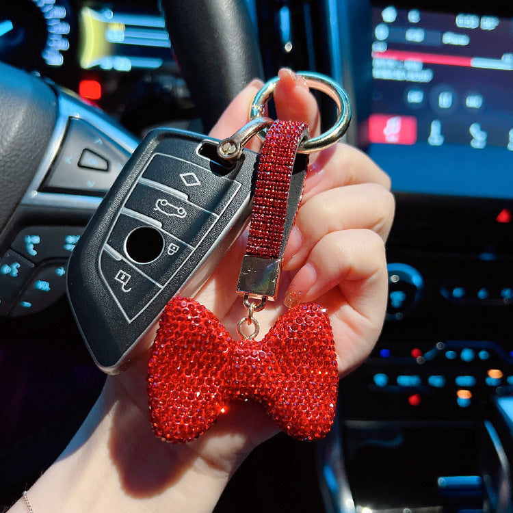 Venta al por mayor Llavero encantador del arco del diamante