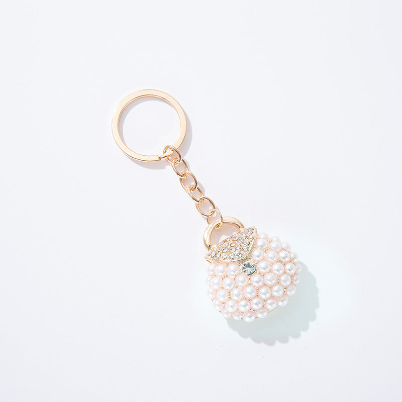 Llavero de bolsa de perlas de diamantes de aleación al por mayor